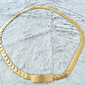 VTG 1970’s Gold Tone Serpentine Floral Embossed Stretch Slim Belt